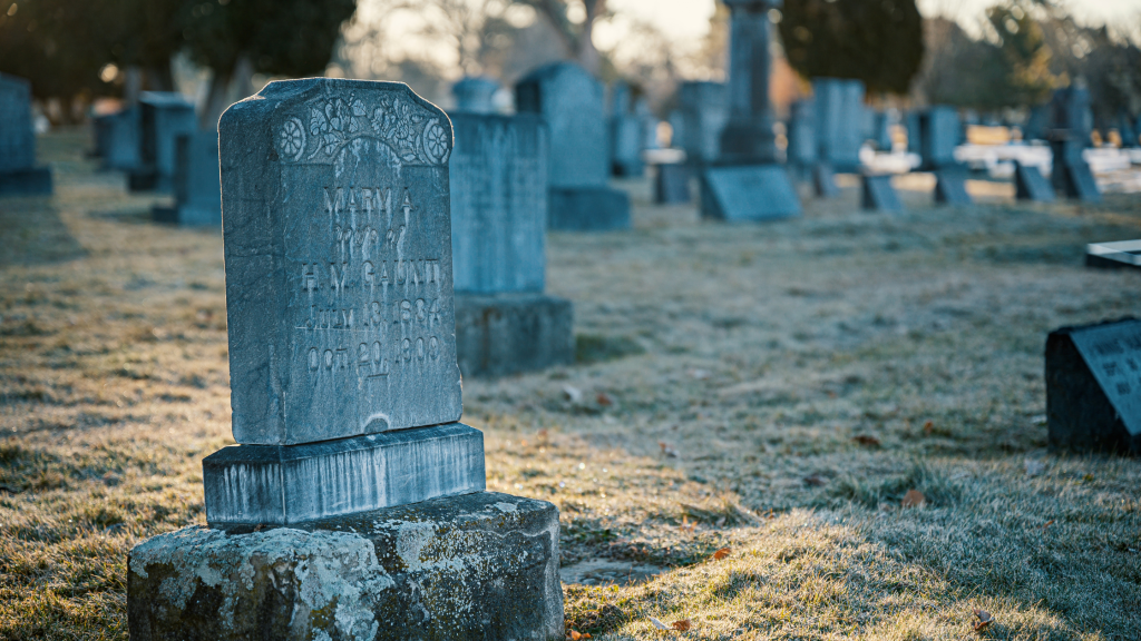 An old gravestone in a graveyard